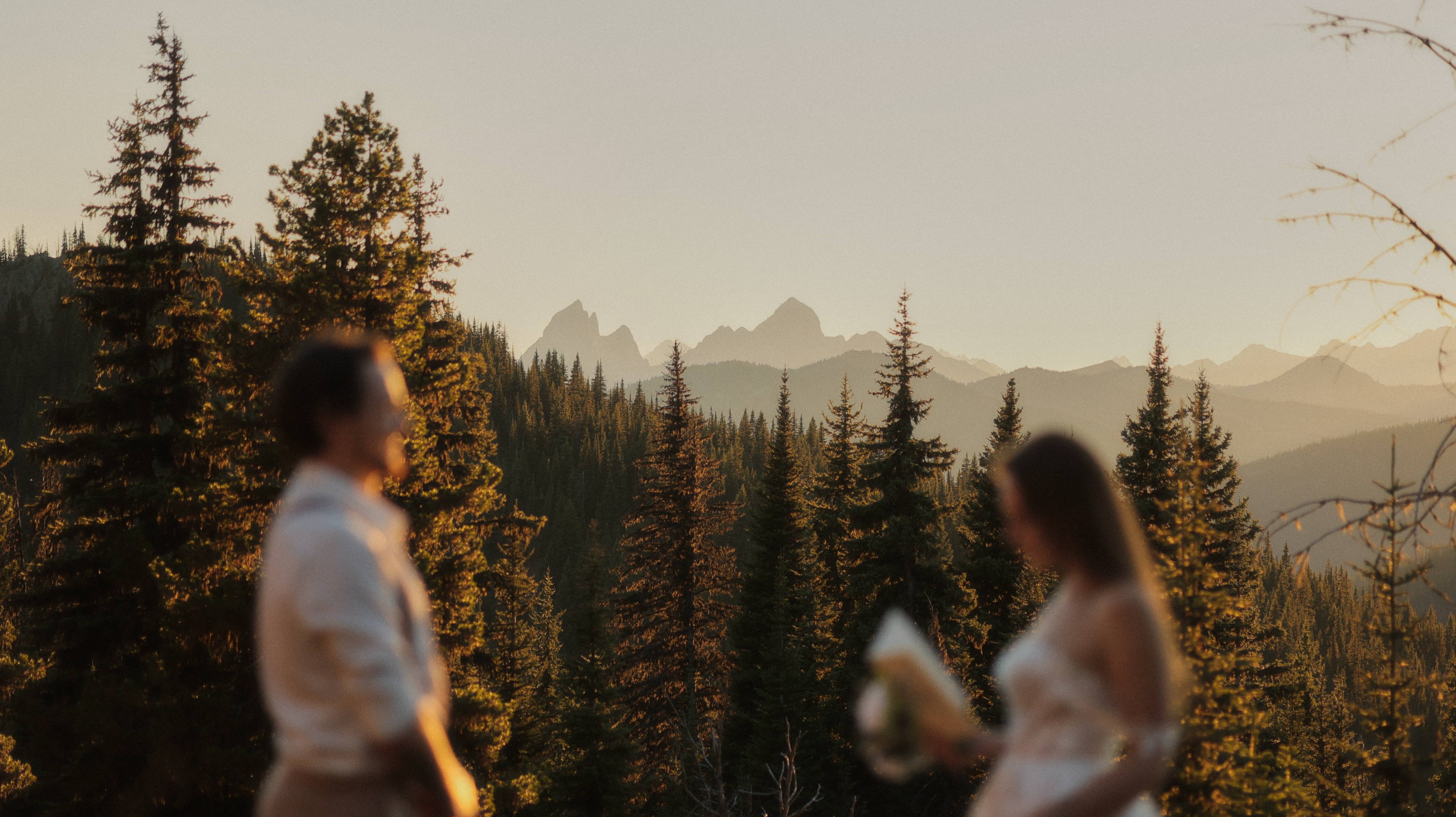 Wide cinematic frame of mountains at first light